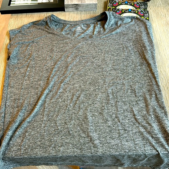 Loose fit champion tank with angled bottom - Picture 1 of 3